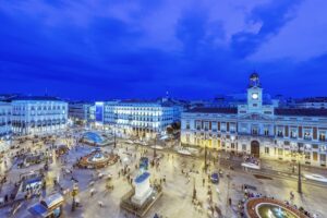 Ornate buildings illuminated at night, Madrid, Madrid, Spain